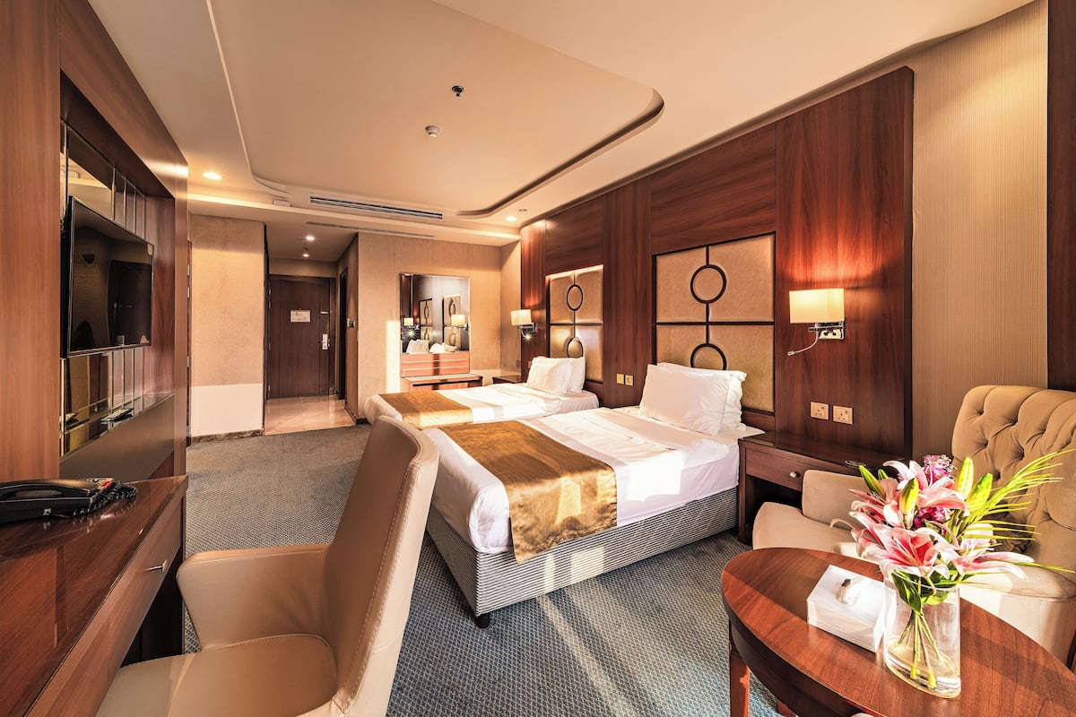 Chambre Deluxe avec lits jumeaux | Minibar, Wi-Fi gratuit, draps fournis