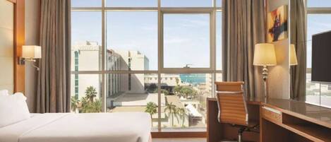 Suíte júnior | Frigobar, Wi-Fi de cortesia, roupa de cama