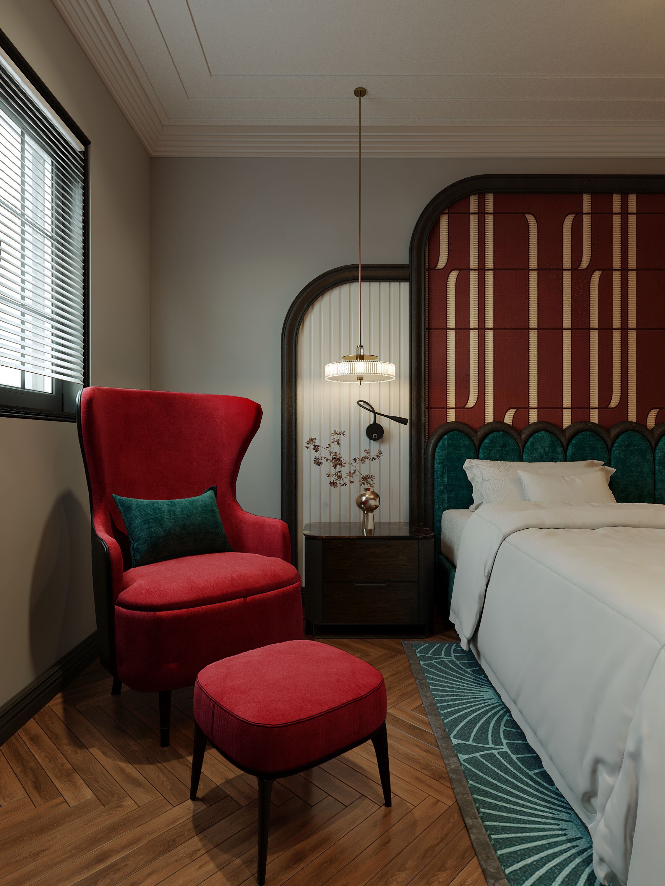Une chambre avec un fauteuil rouge, un pouf assorti, un lit avec une literie de couleur turquoise et un luminaire suspendu.