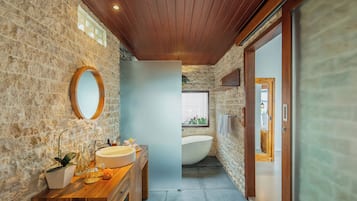 Deluxe Villa, Balcony, Pool View | Bathroom | Separate tub and shower, free toiletries, hair dryer, bathrobes
