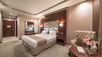 Kamar Double Deluks, 1 Tempat Tidur King | Minibar, meja kerja, Wi-Fi gratis, dan seprai linen