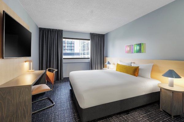 Premium bedding, down comforters, pillowtop beds, in-room safe