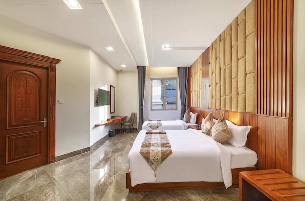 Family Triple Room, City View | In-room safe, desk, blackout curtains, soundproofing
