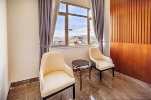Family Quadruple Room, City View | In-room safe, desk, blackout curtains, soundproofing