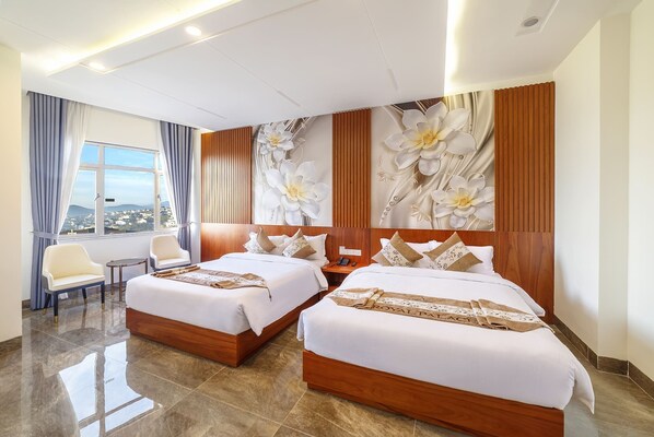 Family Quadruple Room, City View | In-room safe, desk, blackout drapes, soundproofing