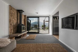 TV, fireplace, books, offices