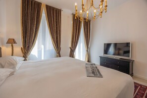 Premium Suite, Balcony, City View | In-room safe, desk, laptop workspace, blackout drapes