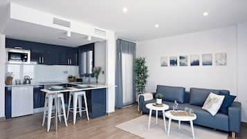 Apartament, 1 dormitori | Sala d'estar | Televisor de pantalla plana