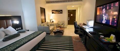 Habitación Deluxe, 1 cama de matrimonio grande | Escritorio, wifi gratis, ropa de cama