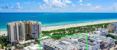 On the beach, sun-loungers