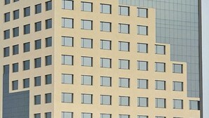 A Playotel Grande hotel with a modern facade, multiple floors, and a prominent entrance with a covered area. - Playotel Grande Rau (Indore)