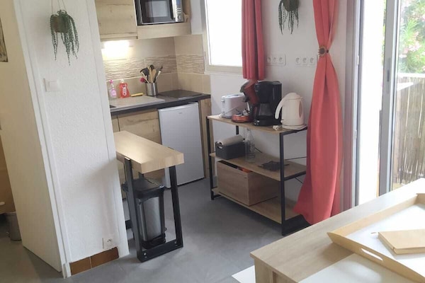 Pièce de vie avec cuisine