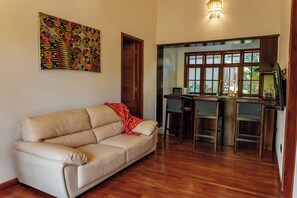 Deluxe Cottage, 2 Bedrooms, Private Pool, Garden View | Living area | 40-inch LCD TV with satellite channels - Shoki Shoki Lodge (Arusha)