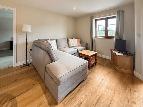 You’ll love the stylish step-free layout and peaceful countryside setting.