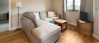 You’ll love the stylish step-free layout and peaceful countryside setting.
