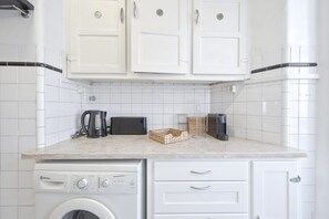 Microwave, coffee/tea maker, cookware/dishes/utensils
