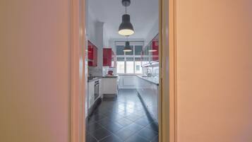 Microwave, dishwasher, coffee/tea maker, cookware/dishes/utensils