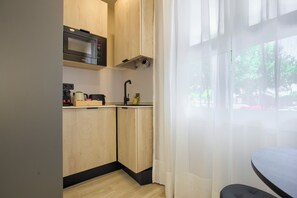 Double Room, Ground Floor | Iron/ironing board, free WiFi