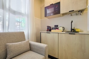 Triple Room, Ground Floor | Iron/ironing board, free WiFi