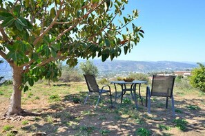 Outdoor dining - Spacious house surrounded by nature, yet close to the center of Chania. (CHANIA)
