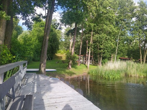 Domek na Mazurach z prywatnym dostępem do jeziora - wakacje na 4 łapy