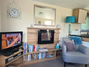 House, 2 Bedrooms, Terrace, Garden View | Living room | Books - The Mayflower - Family & Pet Friendly (Millom)