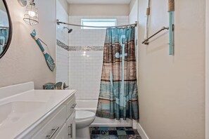 Shower, hair dryer, towels