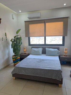 2 habitaciones, tabla de planchar con plancha, wifi y ropa de cama