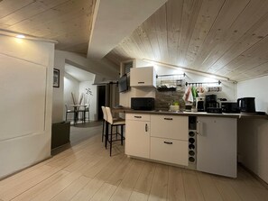 Fridge, microwave, coffee/tea maker, electric kettle