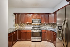 Condo, 2 Bedrooms | Private kitchen | Fridge, oven