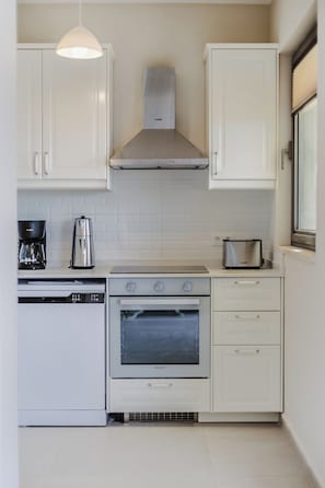 Mini-fridge, microwave, oven, stovetop