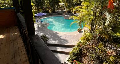 Spacious 6-bedroom villa in Tranquil Monseñor Nouel with AC