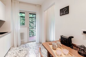 Condo | Literie de qualité, couette en duvet, fer et planche à repasser