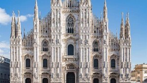 A Gothic-style cathedral with multiple spires and ornate architectural details.