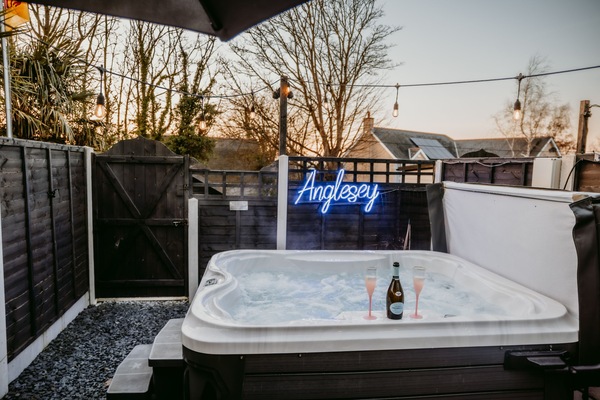 back garden with hot tub