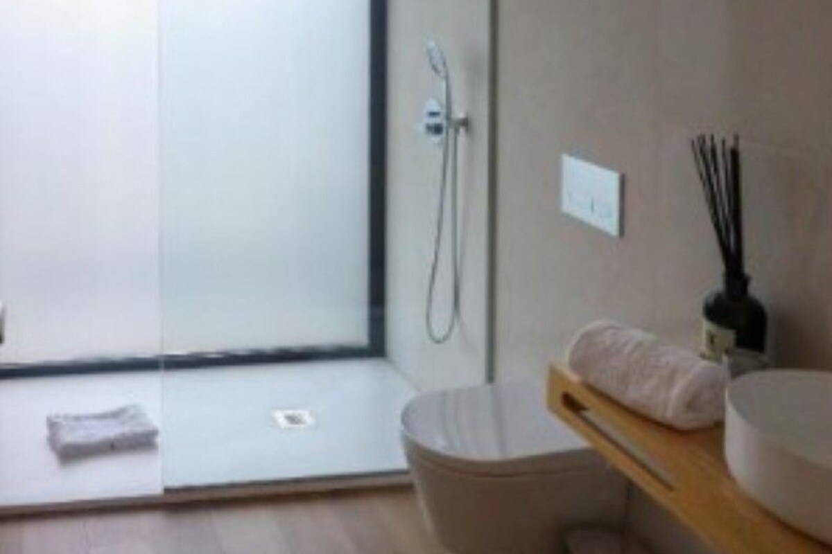 Bathroom | Hair dryer, bathrobes, towels, soap