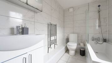 Hair dryer, towels, soap, toilet paper