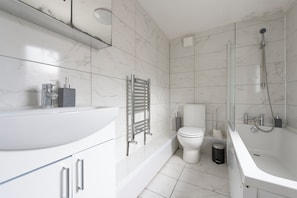 Hair dryer, towels, soap, toilet paper