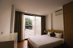 Deluxe Apartment, 2 Bedrooms, City View | Desk, laptop workspace, blackout curtains, free WiFi