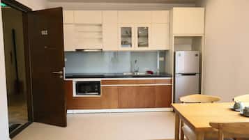 Deluxe Apartment, 1 Bedroom, City View | Private kitchen | Mini-fridge, microwave, stovetop, electric kettle