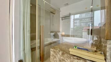 Deluxe Apartment, 2 Bedrooms, City View | Bathroom | Hair dryer, slippers, bidet, towels