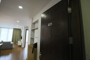 Deluxe Apartment, 2 Bedrooms, City View | Desk, laptop workspace, blackout drapes, free WiFi