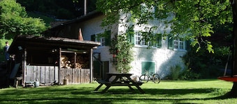 Chalet on the edge of the forest with a view of the waterfall right next door