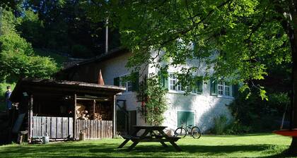 Chalet on the edge of the forest with a view of the waterfall right next door