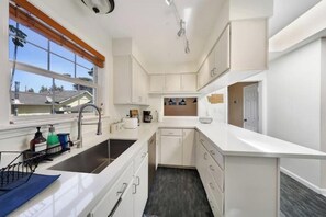 Fridge, ice maker, dining tables