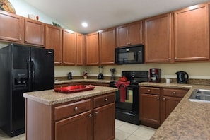Fridge, microwave, oven, dishwasher - NEW! Family-Friendly Villa: Pool, Spa, Game Room & Minutes to Disney (Kissimmee)