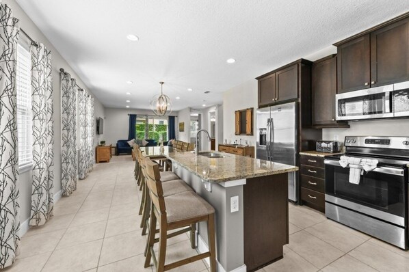 Fridge, microwave, dishwasher, coffee/tea maker - NEW! Elegant 8BR Retreat w/ Private Pool, Spa & Family-Friendly Comfort (Kissimmee)