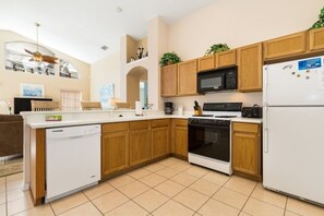 Fridge, microwave, oven, dishwasher - NEW! Magical 3BR Pool Home in Oak Island Harbor Close to Parks (Kissimmee)