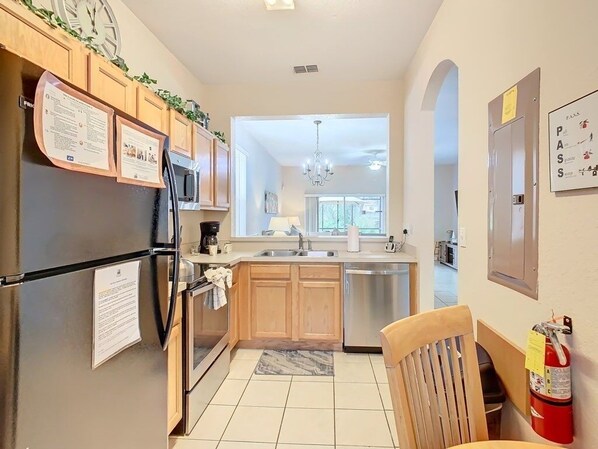 Fridge, microwave, oven, dishwasher - NEW! Regal Oaks Getaway: 4BR Home Close to Disney & Old Town (Kissimmee)
