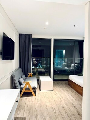 Appart'hôtel Luxe, balcon, vue ville | Coin séjour